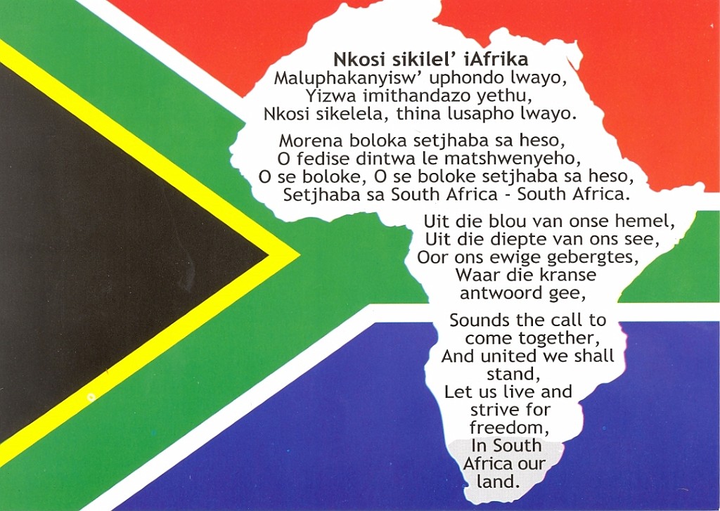 sa004.jpg - Op de vlag : een stuk uit het volkslied (in 3 talen)